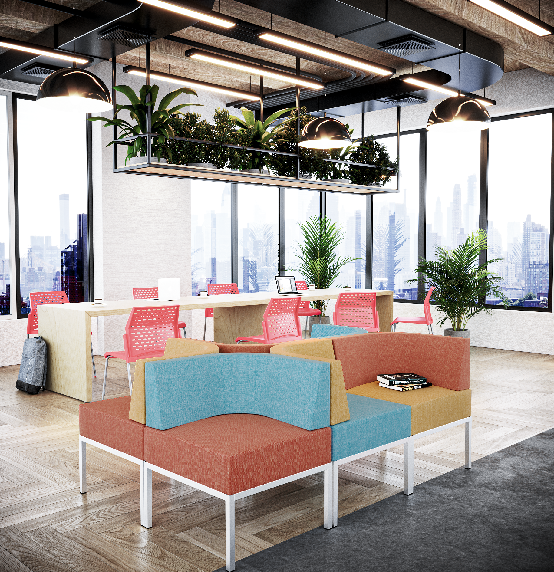 Espacios de descanso en oficinas con sillones y mesas colaborativas